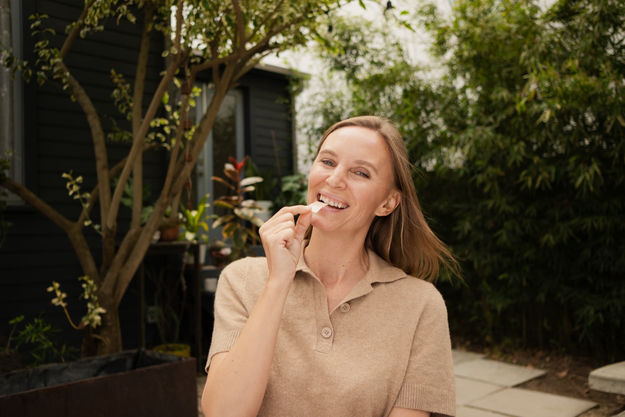 Taking an Oprimaze sublingual strip